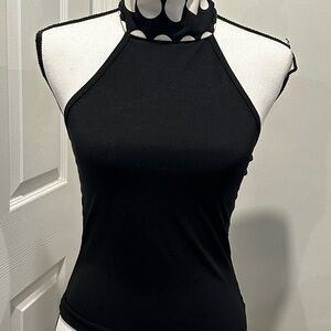 Black top with black and white scarf